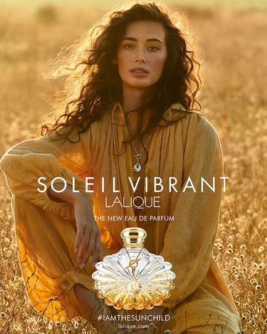 <img alt="Lalique Soleil Vibrant EDP 50ml product shot with model">